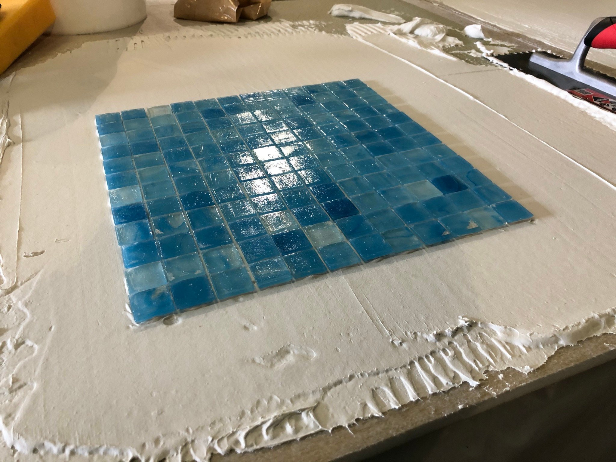 Glass Tile Vs. Ceramic Tile Which Is Best For Your Pool?